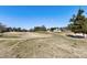 View of the community golf course from the backyard of the property at 192 Solheim Ln, Raleigh, NC 27603