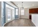 Bright dining area features hardwood floors and lots of windows providing tons of natural light at 192 Solheim Ln, Raleigh, NC 27603