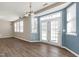 Inviting dining area with hardwood floors, natural light, and access to the outdoor patio at 192 Solheim Ln, Raleigh, NC 27603