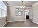 Elegant dining room showcasing the beautiful flooring and natural light at 192 Solheim Ln, Raleigh, NC 27603