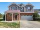 Charming two-story home with a two-car garage and a cozy front porch at 192 Solheim Ln, Raleigh, NC 27603
