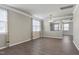 Hardwood floors and natural lighting highlight this empty living room, a blank canvas for any new homeowner at 192 Solheim Ln, Raleigh, NC 27603