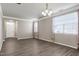 Spacious living room with a white front door, offering ample space at 192 Solheim Ln, Raleigh, NC 27603
