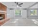 Inviting living room features a cozy fireplace, built-in shelves, and plenty of natural light at 204 N Gurney St, Burlington, NC 27215