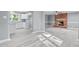 Bright living room featuring a brick fireplace and open floor plan, perfect for entertaining at 204 N Gurney St, Burlington, NC 27215