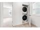 Convenient laundry closet with stacked washer and dryer at 221 Douglas Falls Dr, Wendell, NC 27591