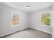 Cozy bedroom with wood-look floors and freshly painted walls, offering a peaceful retreat at 226 1St St, Henderson, NC 27536