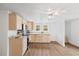 Spacious kitchen features new cabinets, granite countertops, and open layout at 226 1St St, Henderson, NC 27536