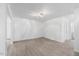Spacious living room with wood-look floors, fresh paint, and an open layout at 226 1St St, Henderson, NC 27536