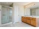 Bathroom with a double vanity, shower and neutral color scheme at 2321 Stony Bottom Dr, Raleigh, NC 27610
