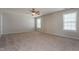 Large bedroom with neutral walls, carpeting, and ceiling fan for comfort at 2321 Stony Bottom Dr, Raleigh, NC 27610