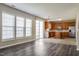 Open kitchen area featuring stainless steel appliances, a kitchen island, and plenty of light at 2321 Stony Bottom Dr, Raleigh, NC 27610