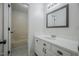Bathroom features a vanity and an adjacent shower area; bright and airy at 2400 Hemlock Cir, Clayton, NC 27520