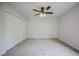 An empty bedroom with carpet, a fan and a closet at 2400 Hemlock Cir, Clayton, NC 27520