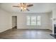 A living area with a view of a window and a fireplace at 2400 Hemlock Cir, Clayton, NC 27520