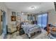 Comfortable bedroom featuring a bed, dresser, and an assortment of decorations at 2521 Friedland Pl # 201, Raleigh, NC 27617
