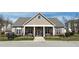 Avera Place Condominiums Information Center with well-maintained landscaping and welcoming entrance at 2521 Friedland Pl # 201, Raleigh, NC 27617