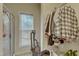 Laundry room with a sink, a window, and storage space at 2521 Friedland Pl # 201, Raleigh, NC 27617