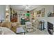 Cozy living room with comfortable seating, fireplace, and unique decor at 2521 Friedland Pl # 201, Raleigh, NC 27617