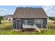 Exterior backyard showcasing a deck, well-maintained lawn, and privacy fence at 265 Beckwith Ave, Clayton, NC 27527
