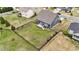 Aerial view of the backyard featuring a fenced yard with space for outdoor activities at 265 Beckwith Ave, Clayton, NC 27527