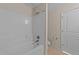 Bathroom with white tiled shower and white toilet at 265 Beckwith Ave, Clayton, NC 27527