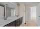 Bathroom featuring double sink vanity and tile floors, offering a practical and stylish space at 265 Beckwith Ave, Clayton, NC 27527