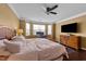 Inviting bedroom featuring hardwood floors and a large window, providing plenty of natural light at 265 Beckwith Ave, Clayton, NC 27527