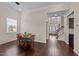 A dining area featuring hardwood floors, an abundance of natural light, and an open floorplan at 265 Beckwith Ave, Clayton, NC 27527
