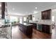 Spacious kitchen with granite countertops, stainless appliances, and hardwood floors at 265 Beckwith Ave, Clayton, NC 27527