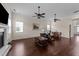 A spacious living room featuring dark hardwood floors, a fireplace and lots of natural light at 265 Beckwith Ave, Clayton, NC 27527
