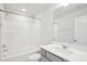 Bathroom featuring a shower-tub combo and modern vanity at 272 Hiking Hill Ln, Garner, NC 27529