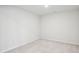 Empty bedroom featuring neutral carpet and paint at 272 Hiking Hill Ln, Garner, NC 27529