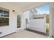 Porch featuring white siding, an outdoor light fixture, and a view of the backyard at 272 Hiking Hill Ln, Garner, NC 27529