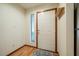 Bright foyer with white front door, wood floors and space for a small table at 308 Cedarwood Ln, Carrboro, NC 27510