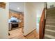 Open kitchen layout featuring stainless steel appliances and wood flooring at 308 Cedarwood Ln, Carrboro, NC 27510