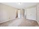 Bedroom with plush carpeting, a large closet, and ample space for furnishings at 3421 E Jameson Rd, Raleigh, NC 27604