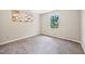 Bedroom with a window overlooking the surrounding greenery and neutral decor at 3421 E Jameson Rd, Raleigh, NC 27604