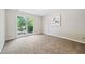 Bedroom with a window providing lots of natural light and neutral decor at 3421 E Jameson Rd, Raleigh, NC 27604