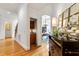 View from hallway to the kitchen and dining room at 3530 Thorndike Dr, Wake Forest, NC 27587