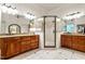 Spacious main bathroom featuring a tiled shower, double vanity and granite countertops at 3530 Thorndike Dr, Wake Forest, NC 27587