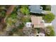 Overhead view of the home showcasing a large patio with outdoor seating and a beautifully landscaped yard at 3705 Andoversford Ct, Wake Forest, NC 27587