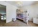 bedroom featuring a bunk bed and chandelier lighting at 3705 Andoversford Ct, Wake Forest, NC 27587