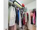 Organized closet with ample storage space and hanging racks for clothes and accessories at 3705 Andoversford Ct, Wake Forest, NC 27587