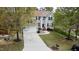 Inviting two-story home featuring a manicured lawn, attached garage, and a classic colonial-style design at 3705 Andoversford Ct, Wake Forest, NC 27587
