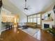 Spacious living room with fireplace, hardwood flooring, and comfortable seating at 3705 Andoversford Ct, Wake Forest, NC 27587