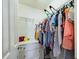 Functional walk-in closet with ample storage, shelving, and organized hanging space at 3705 Andoversford Ct, Wake Forest, NC 27587