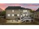 Charming backyard with a screened porch, patio area, and ample space for outdoor entertaining at 3725 Song Sparrow Dr, Wake Forest, NC 27587
