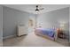 This bedroom features gray walls, a ceiling fan, and a day bed at 3725 Song Sparrow Dr, Wake Forest, NC 27587