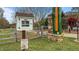 Charming community features a free little library and a stone-detailed neighborhood entrance sign at 3725 Song Sparrow Dr, Wake Forest, NC 27587